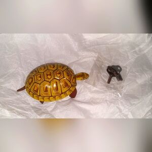 Vintage tin wind up toy turtle. New never used. Smoke free home